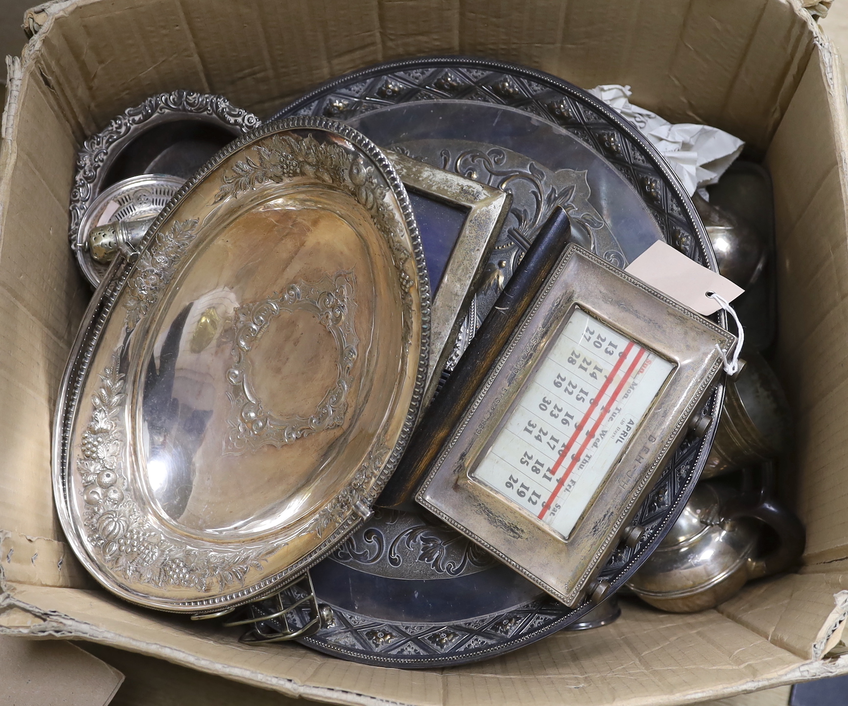 A silver mounted perpetual calendar, a photograph frame and sundry Victorian and later plated ware.